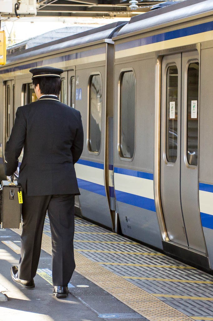 They separated the trains here at the station and this guy got off. Think he's a conductor but Jessica pointed out that the school uniforms look very similar. I will be on my best behavior just in case.