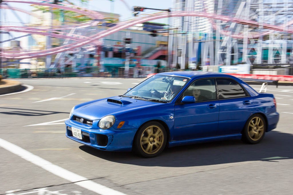 Sweet WRX next to another sweet ride: a roller coaster! Wish I would have had time to frame this better.