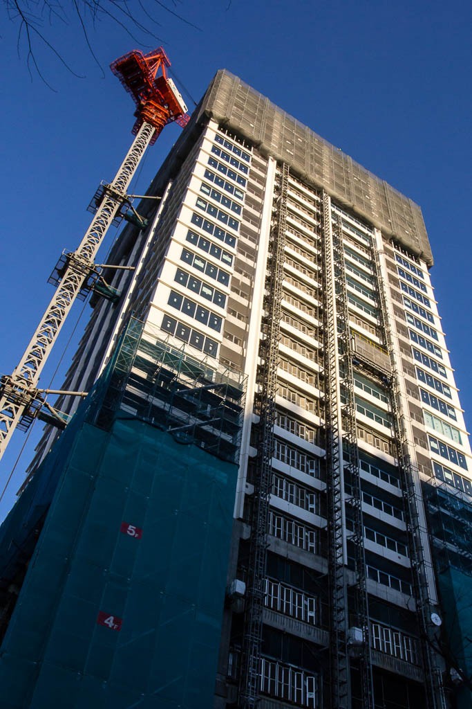 Construction on one of the many high rise buildings. This one had a little elevator mounted to the side of it. Neat to watch.