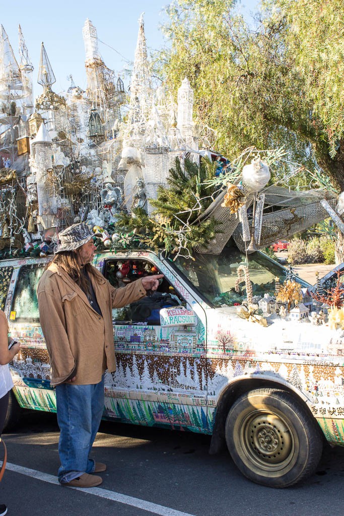 Man with an art car and a parrot. (hence the bird cages) His thing was Christmas from different cultures. Interesting fellow. He was "fun crazy" not "insane crazy".