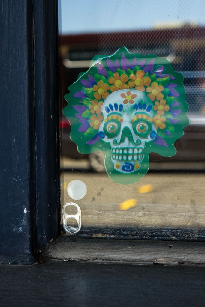 Sticker in a window of the mexican restaurant.