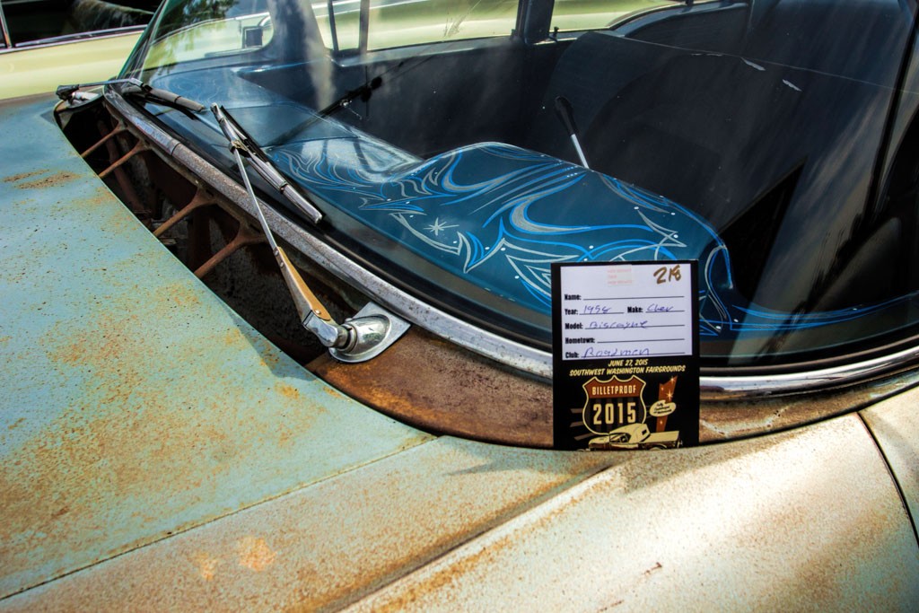 Rusty car with a metalflake pinstriped dash. That's one way to jazz it up!