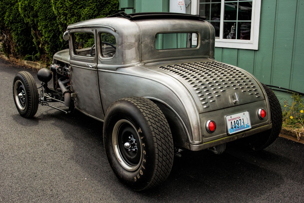 My favorite car. Love the bare steel and louvres in the trunk