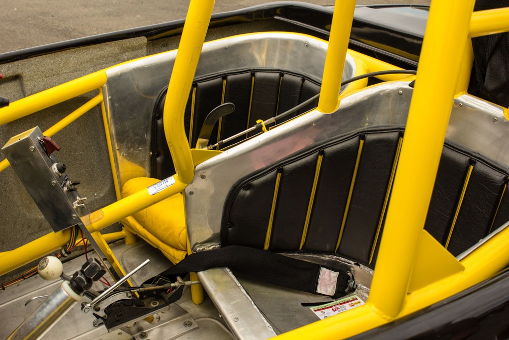 Passenger seat in a funny car cage?! You better be small!