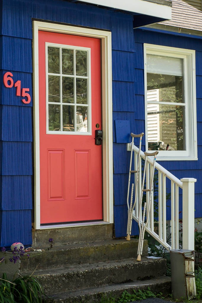 Brightly colored house and crutches