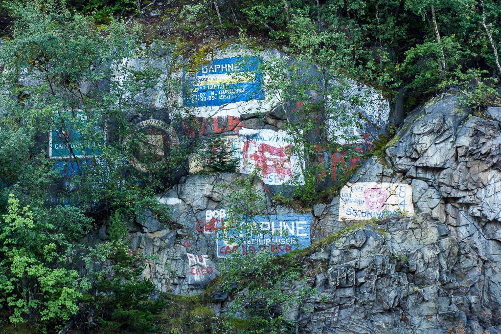 Getting off the ship, the cliff face is painted with the various ships and captains that have visited. I still want to know how they get up there. I'm sure there was a forklift involved. 