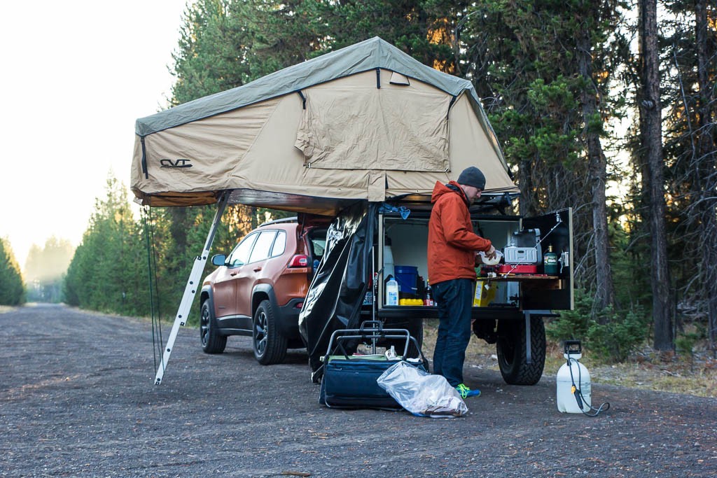 Here's our trailer with the tent unfolded and "kitchen" open for business.