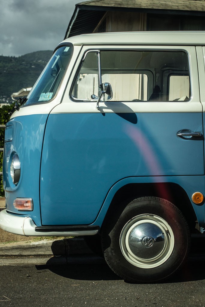 VW van through the window of our beautiful black Ford Focus rental.