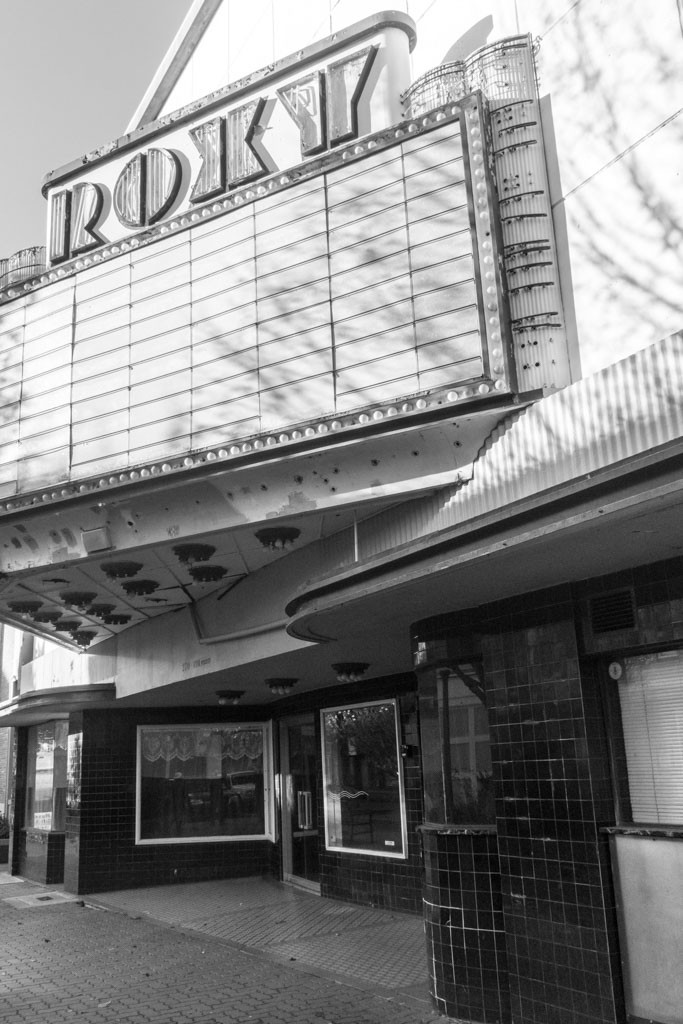 The old Roxy theater.  This photo isn't very interesting. I need to come back when the lighting is right and I can get the angle of the buildings right. The harsh overhead lighting didn't really work out how I would like. 