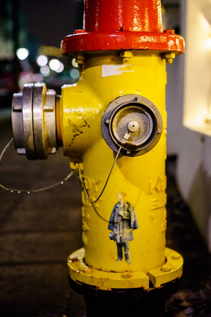 Man on a fire hydrant