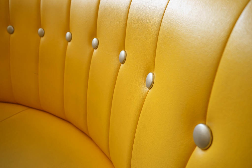 Detail of the seat cushions. The whole café was done up in 50's style yellow.