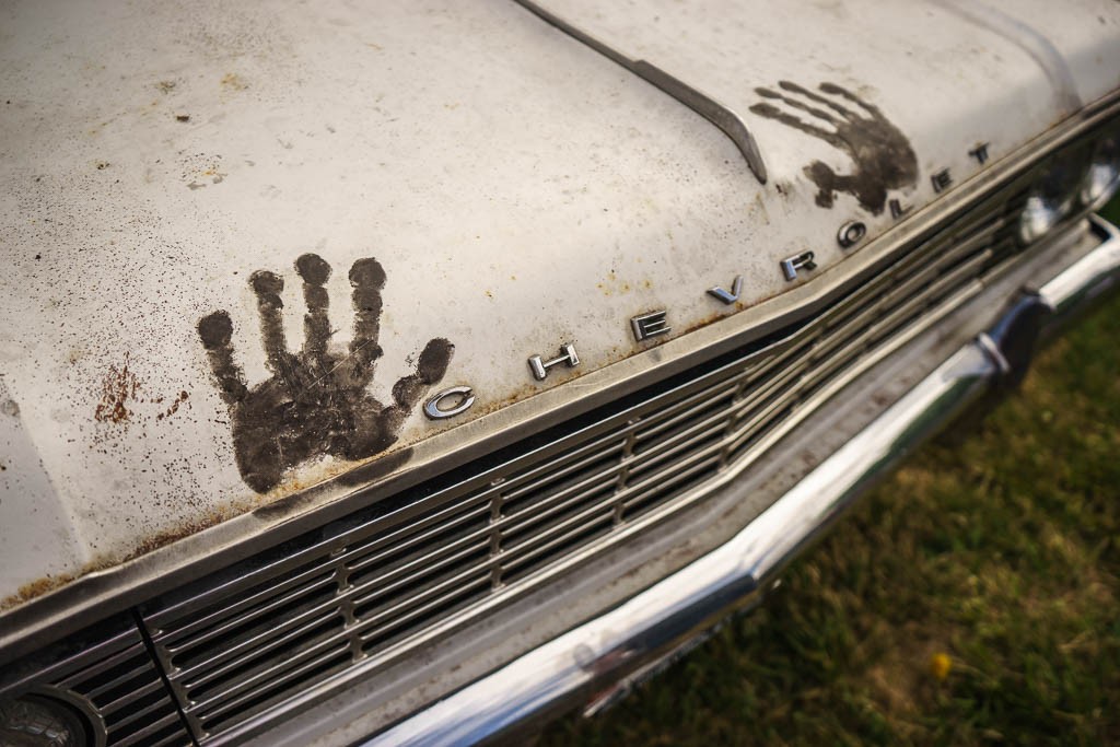 Dirty handprints on the hood. I thought that was funny. 