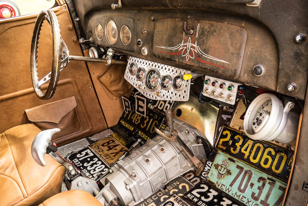 Interior. Love how he used old license plates. Kinda jazzes the car up a bit from the simple interior. 