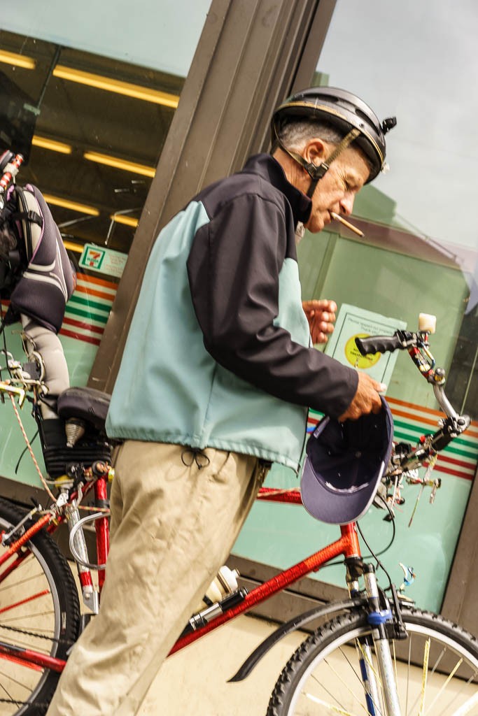 Guy on a bike. One of my random side-snaps that I liked the composition of. 