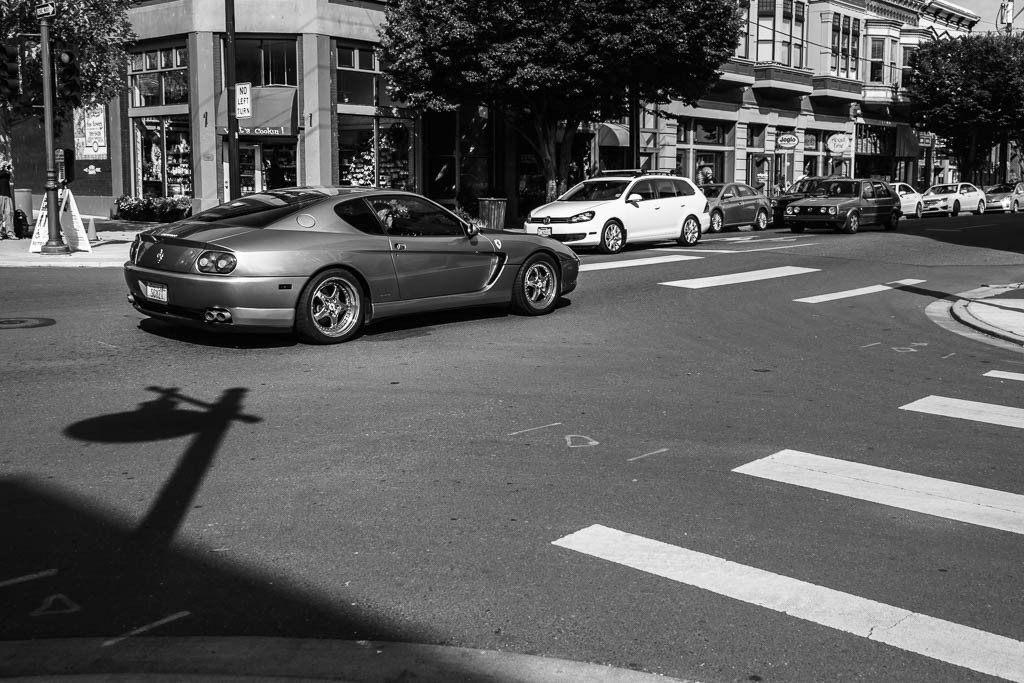 That's a Ferrari. I like the lines created by the crosswalk, but the lighting in the color shot was terrible.